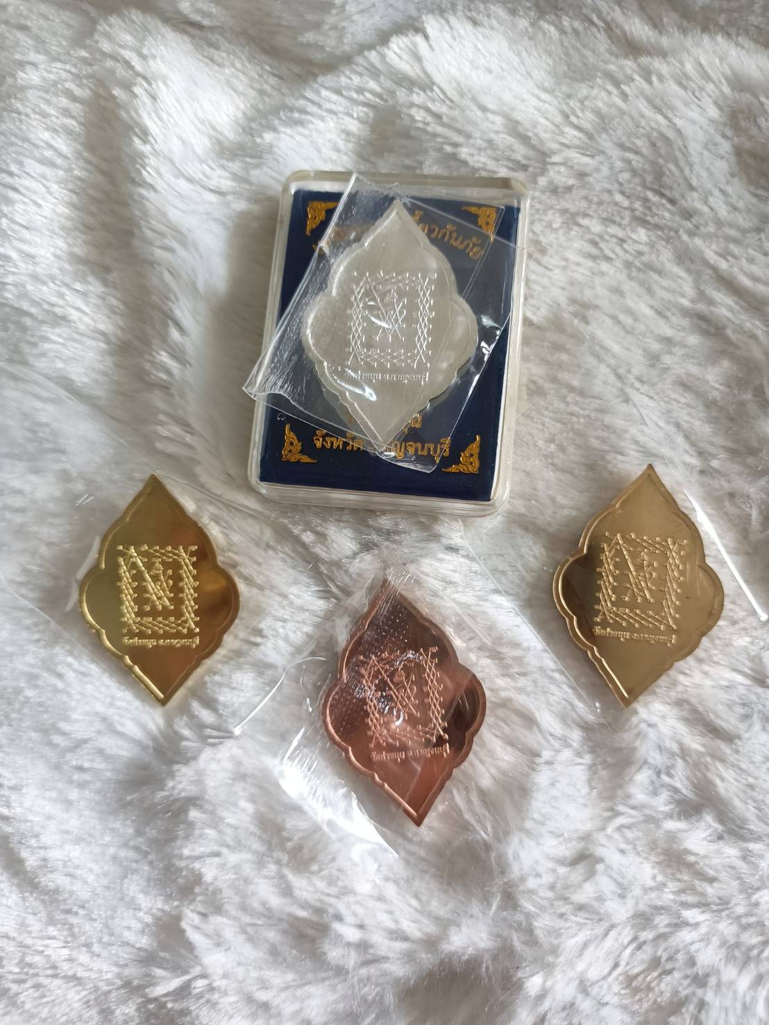 เหรียญนาคเกี้ยวกันภัย ชุด ๔ องค์ เนื้อเงิน ทองแดง ทองเหลือง ทองทิพย์ วัดท่าขนุน