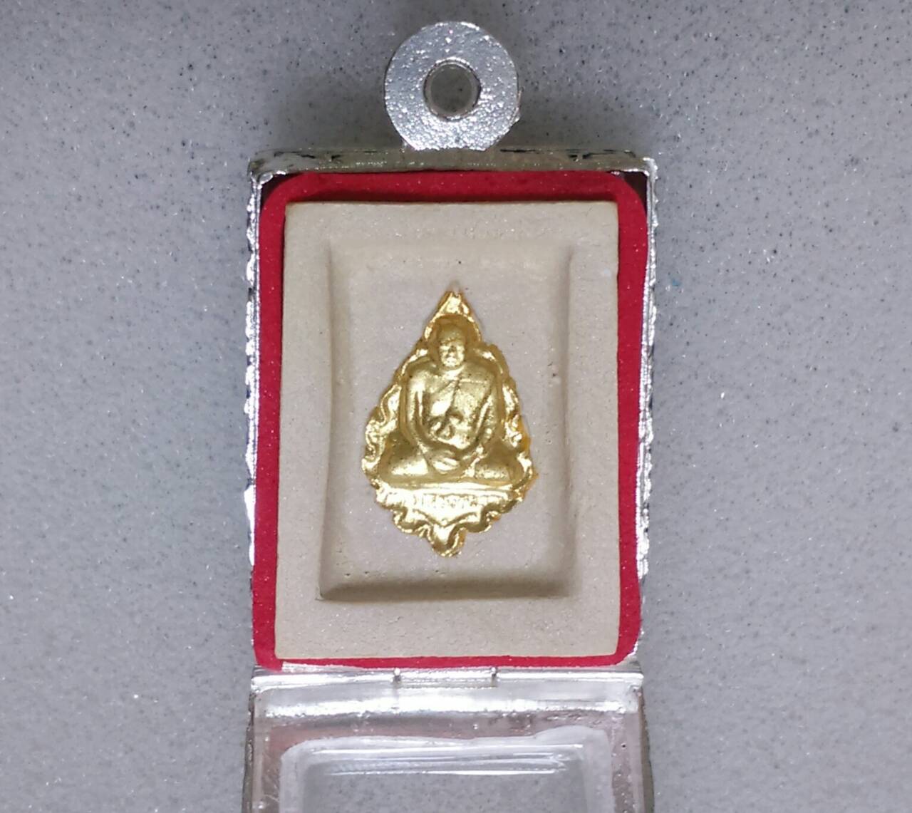 สมเด็จพระคำข้าวปิดทอง (มีเกศา พิมพ์แขนจุด) พร้อมตลับเงิน ล.พ.ฤกษีลิงดำ