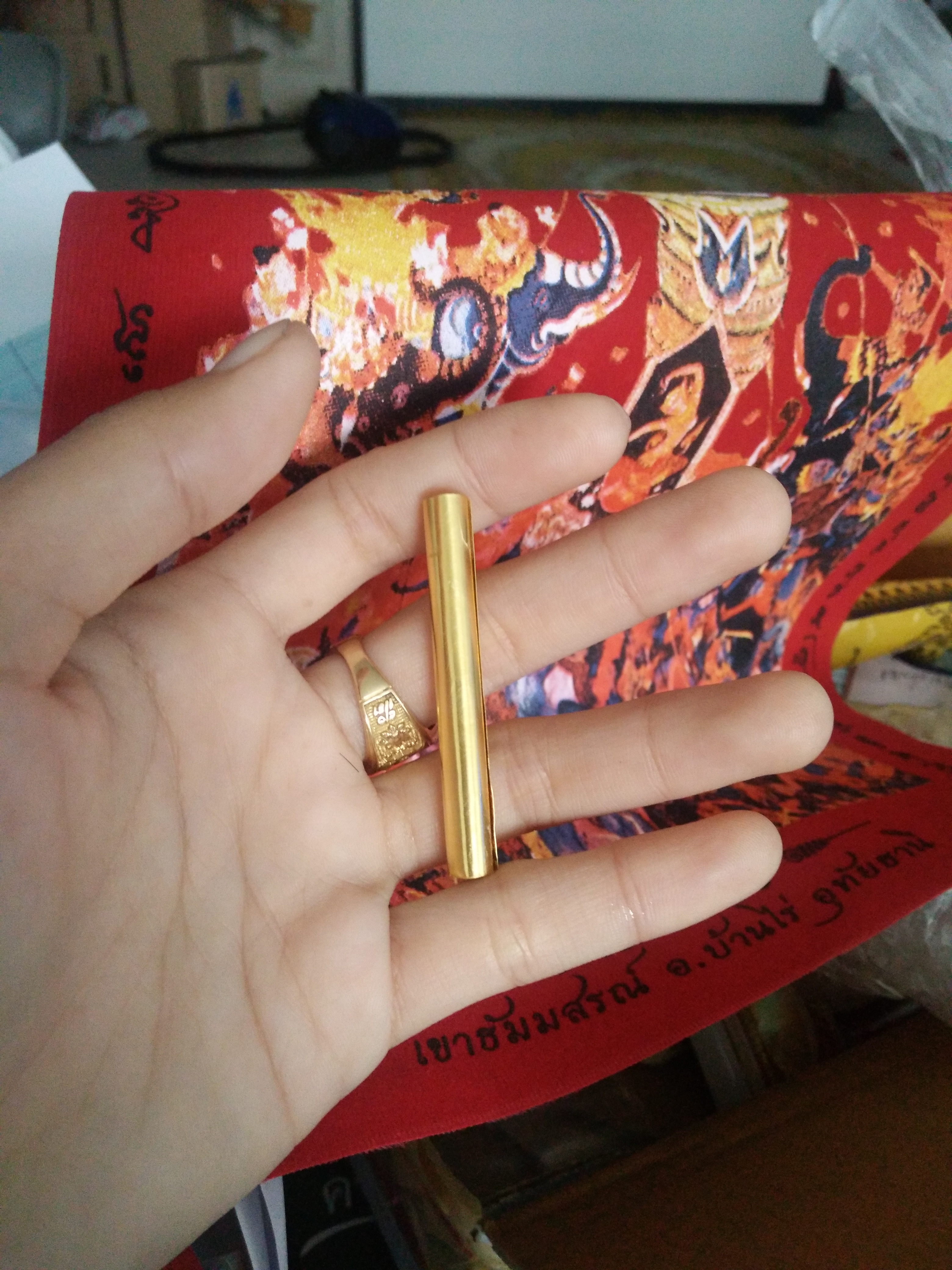 ตะกรุดมหาสะท้อนทองคำ