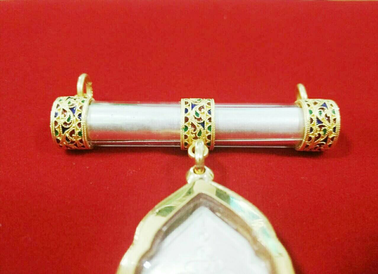 เหรียญพระอุปัชฌาย์ & ตะกรุดมหาสะท้อน รุ่น 5 เลี่ยมทอง