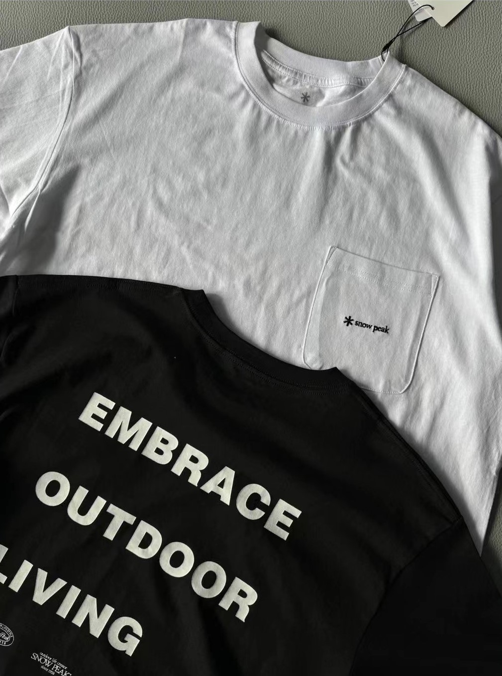 เสื้อโอเวอร์ไซส์ Snow Peak Embrace T-Shirt ของแท้ ของใหม่ พร้อมส่ง เสื้อเดินป่า