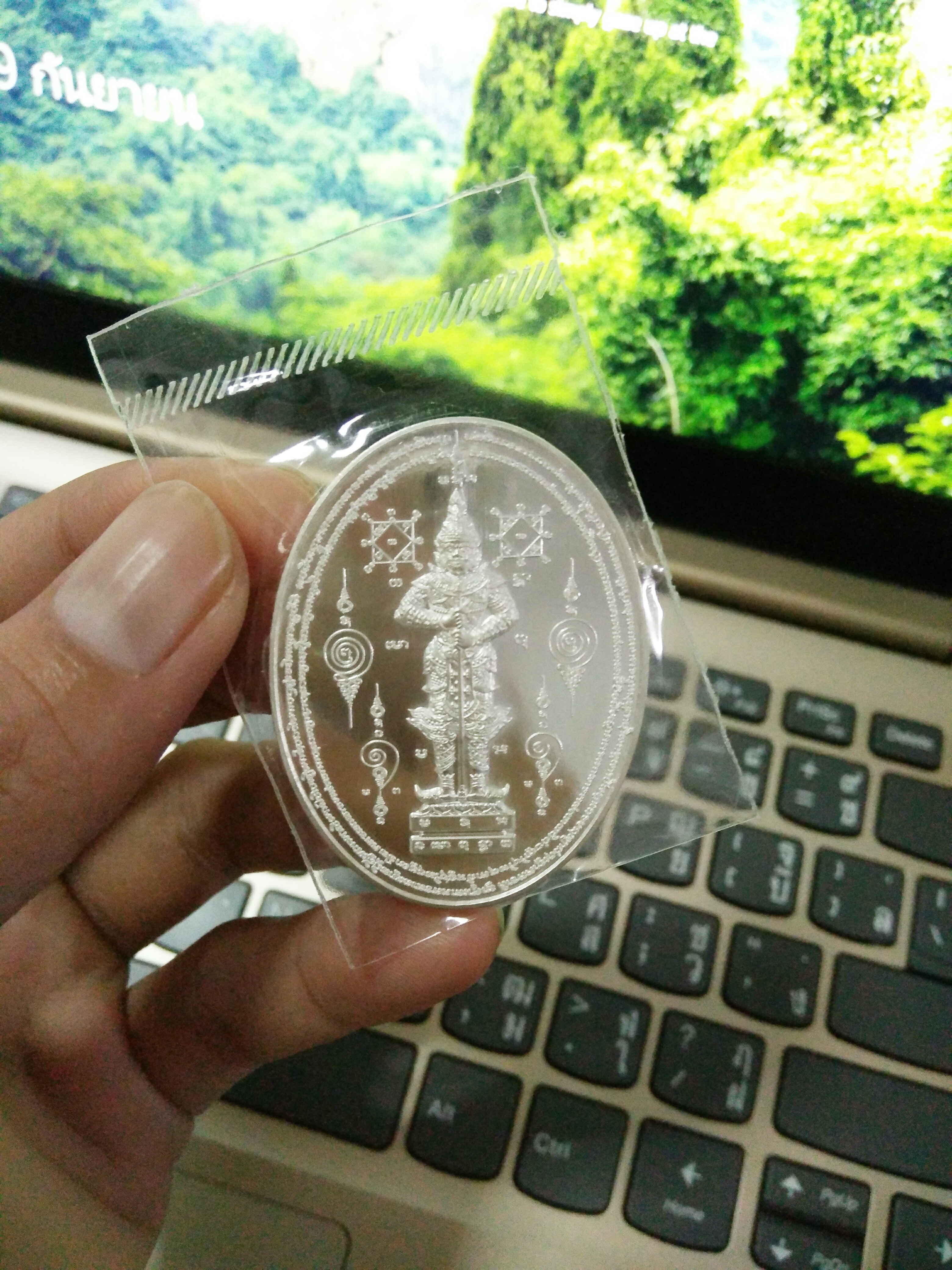 เหรียญรอยพระพุทธบาทฯ หลังท้าวเวสสุวรรณ (เนื้อเงิน) วัดท่าขนุน ปี 61