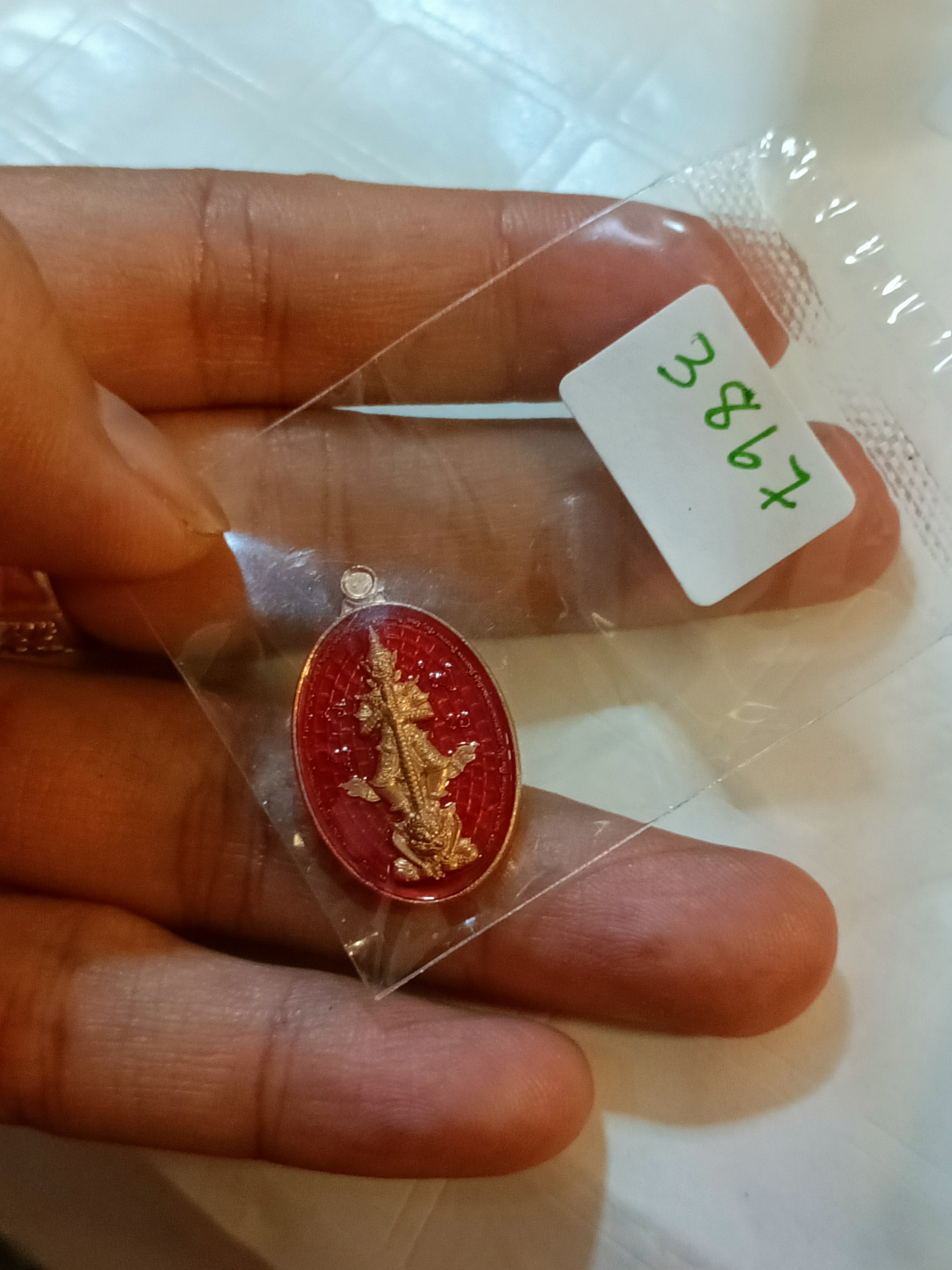 เหรียญเม็ดแตงทองแดงลงยาแดง ท้าวเวสสุวรรณ หลังหุ่นพยนต์ตัวครู รุ่น จตุรพิธพรชัย 2