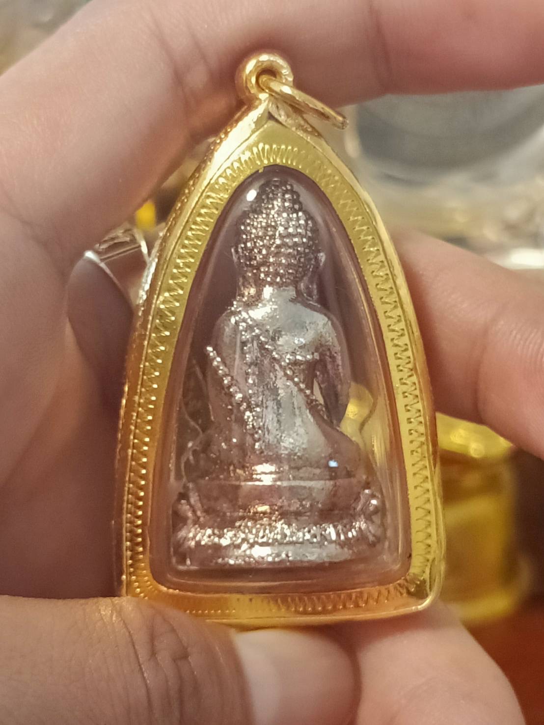 พระกริ่งพิชัยสงคราม รุ่น 2 หลวงพ่อเล็ก วัดท่าขนุน ปี 45 เลี่ยมกรอบเงินชุบทองคำล้อมพลอย