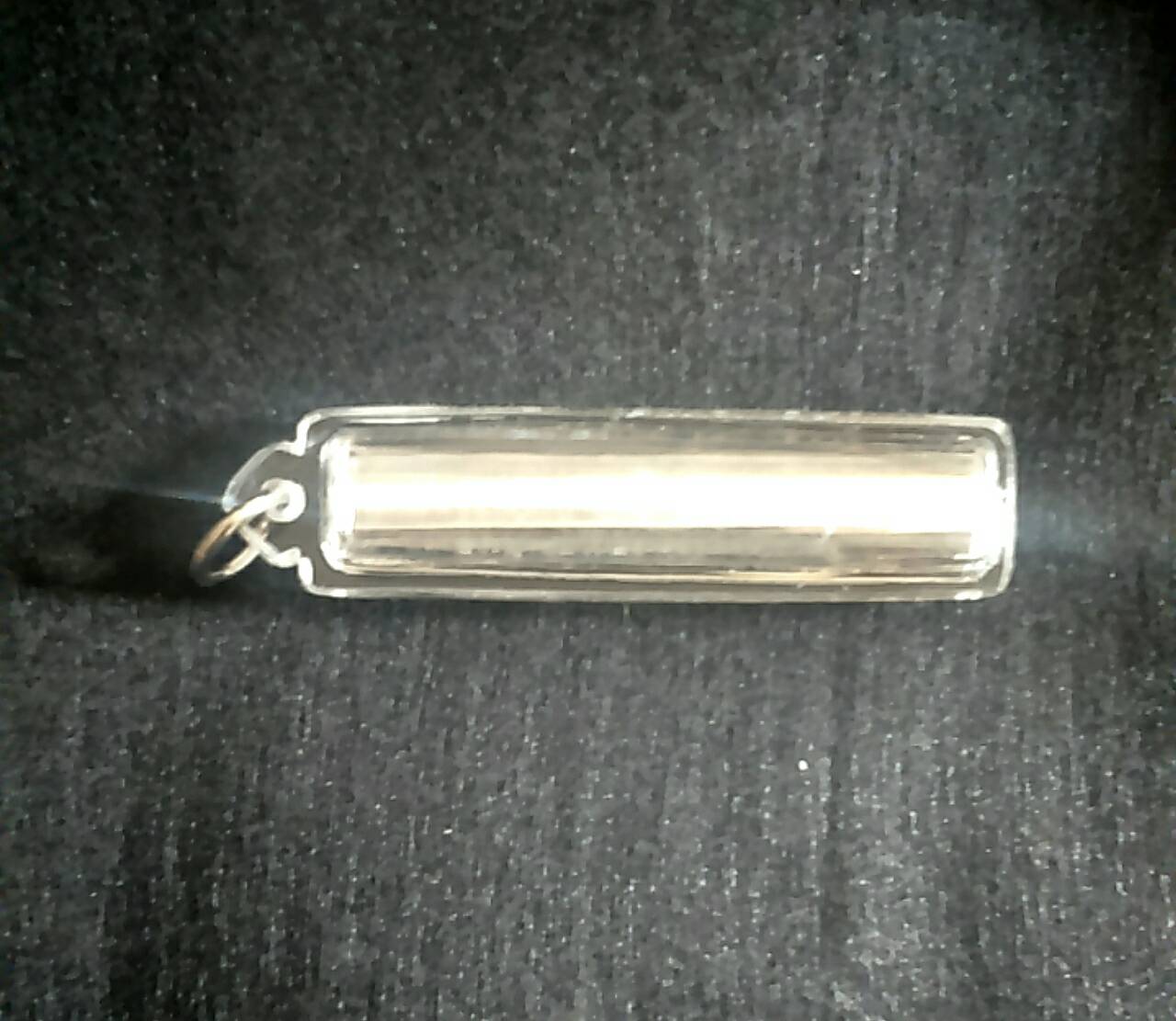 ตะกรุดมหาสะท้อนเนื้อเงิน รุ่น 5 เลี่ยมกันน้ำ พร้อมสติกเกอร์