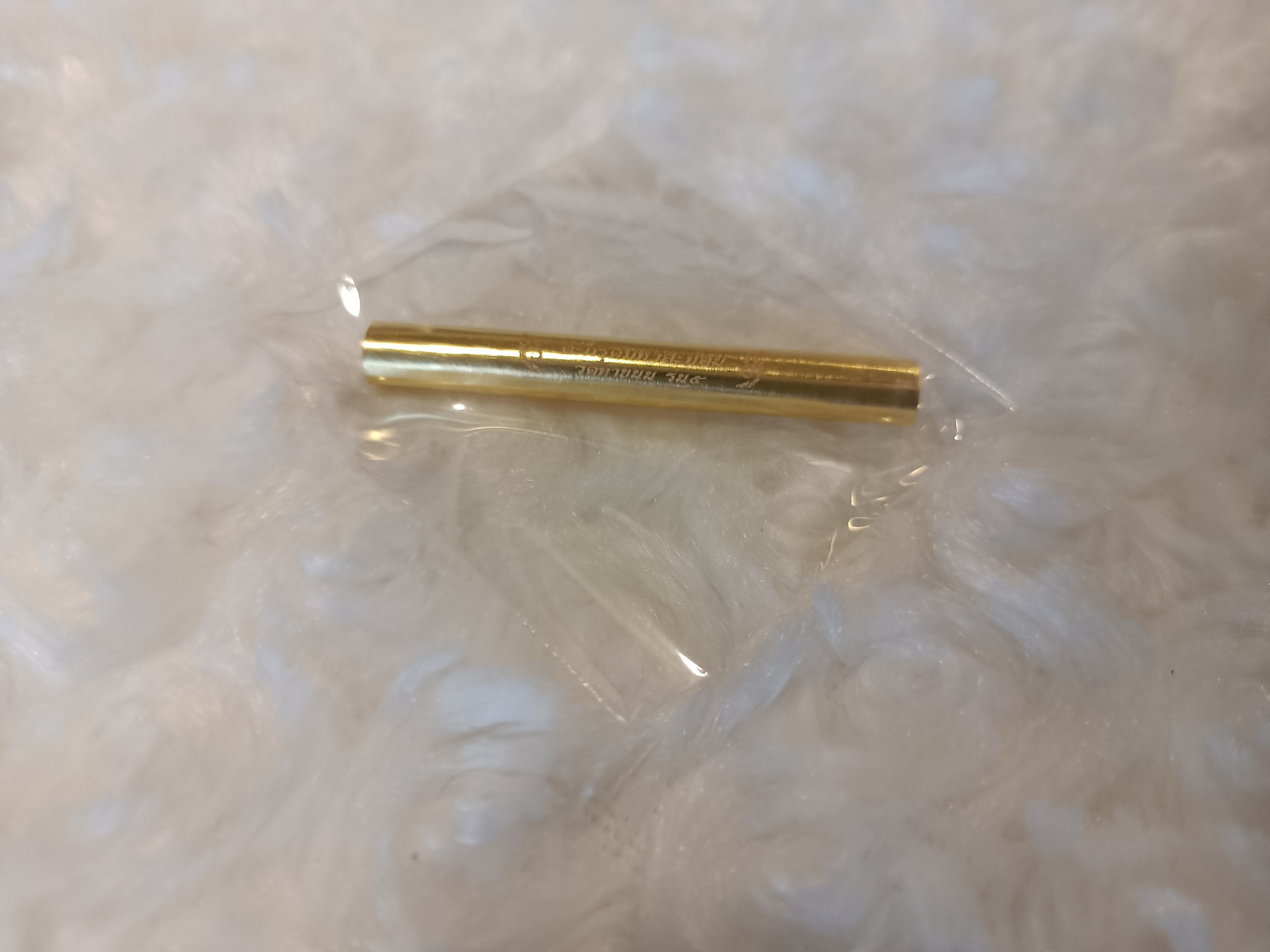 ตะกรุดมหาสะท้อนทองคำ (ซองเดิม)