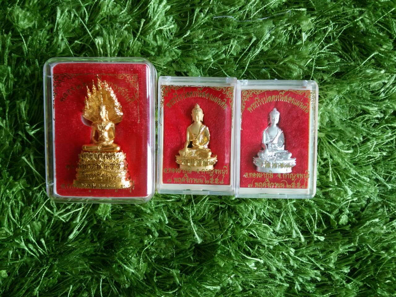 พระพุทธรูปนาคปรกลอยองค์ ขนาด ๒ ซ.ม. เนื้อชุบทอง วัดท่าขนุน