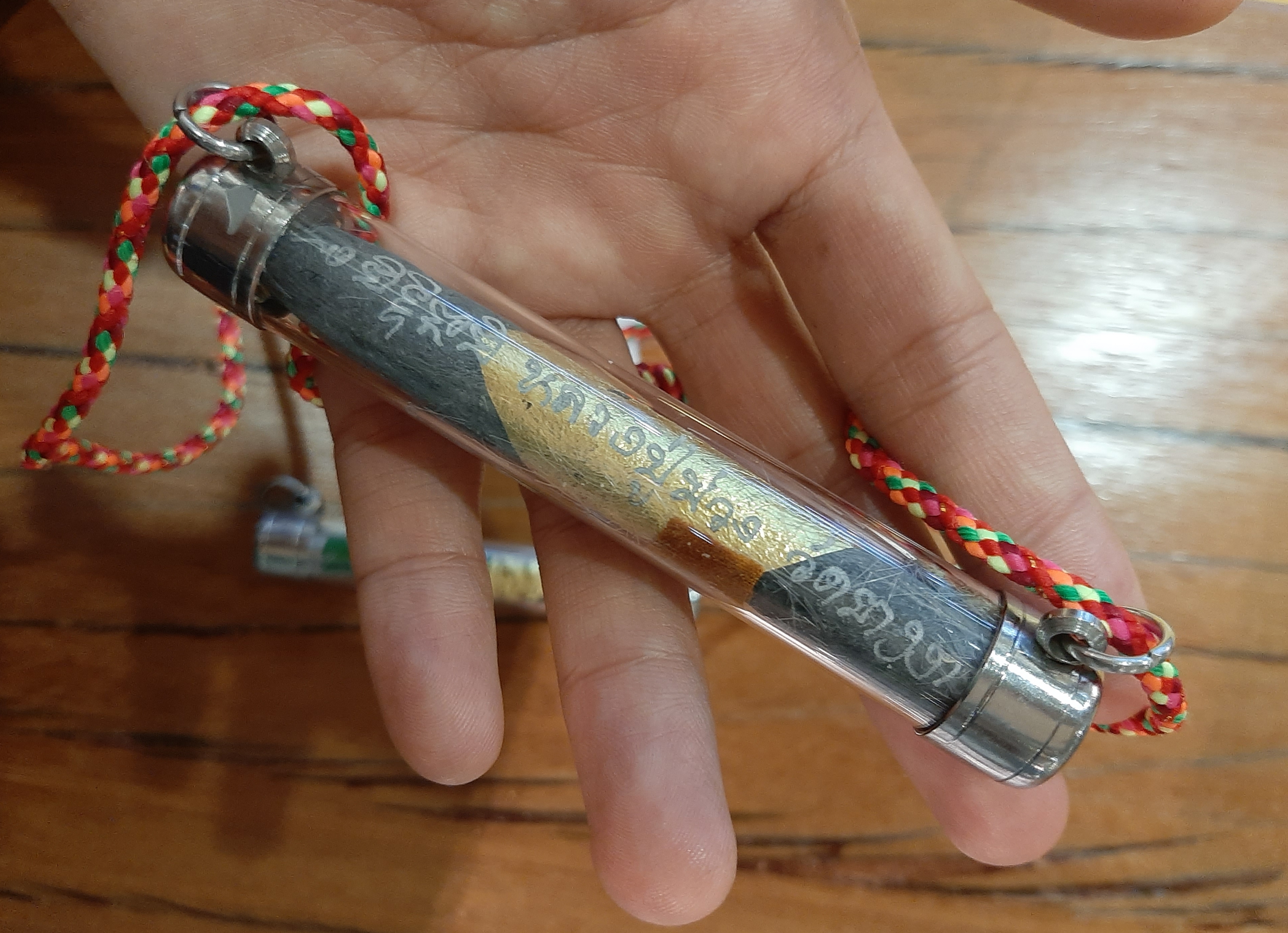 ตะกรุดวัวกินนมเสือ ผงใบลาน มีเกศา ลป.ม่วง วัดยางงาม