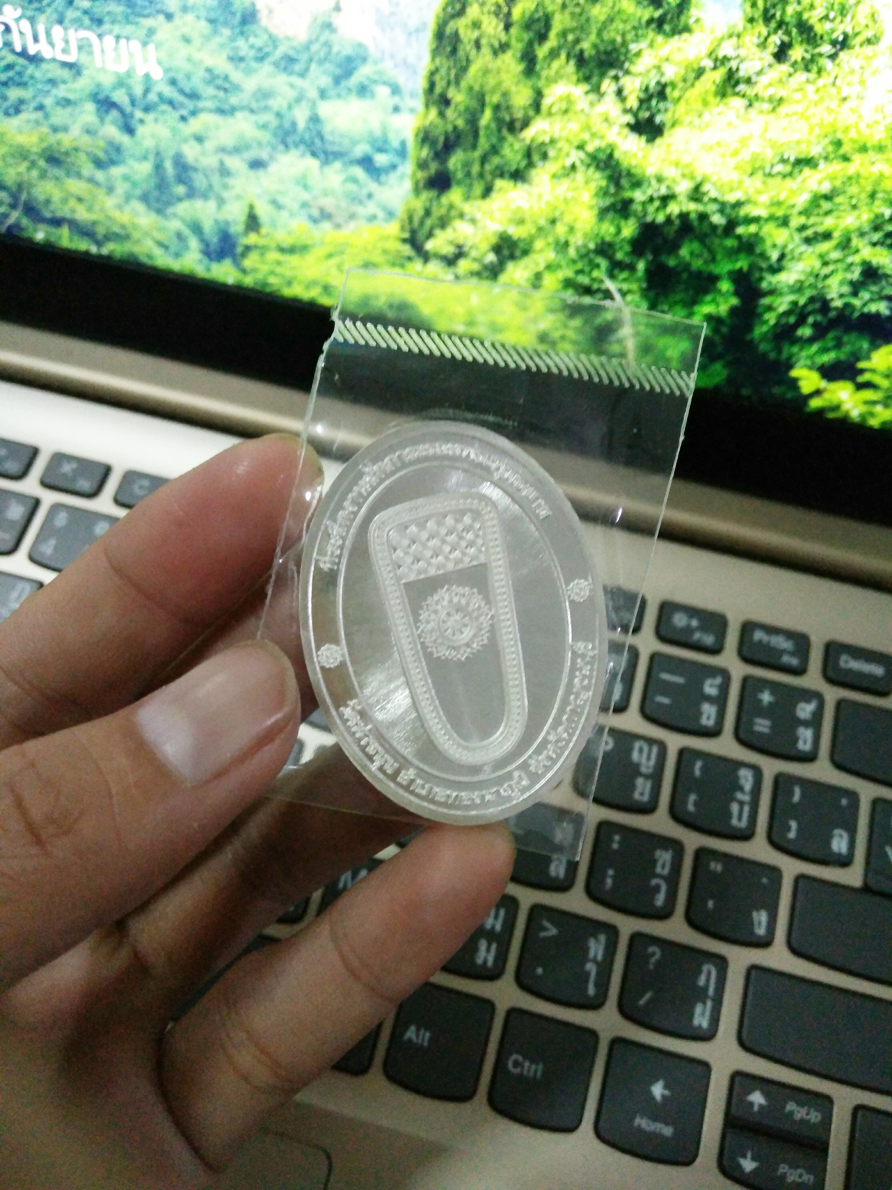 เหรียญรอยพระพุทธบาทฯ หลังท้าวเวสสุวรรณ (เนื้อเงิน) วัดท่าขนุน ปี 61