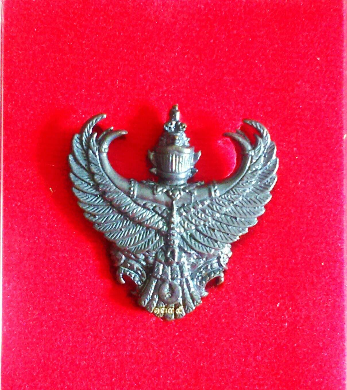 พญาครุฑนวโลหะ รุ่น ๙ หน้ามหาเศรษฐี อ.วราห์ ปี 53 (เจิมและเสกซ้ำ)