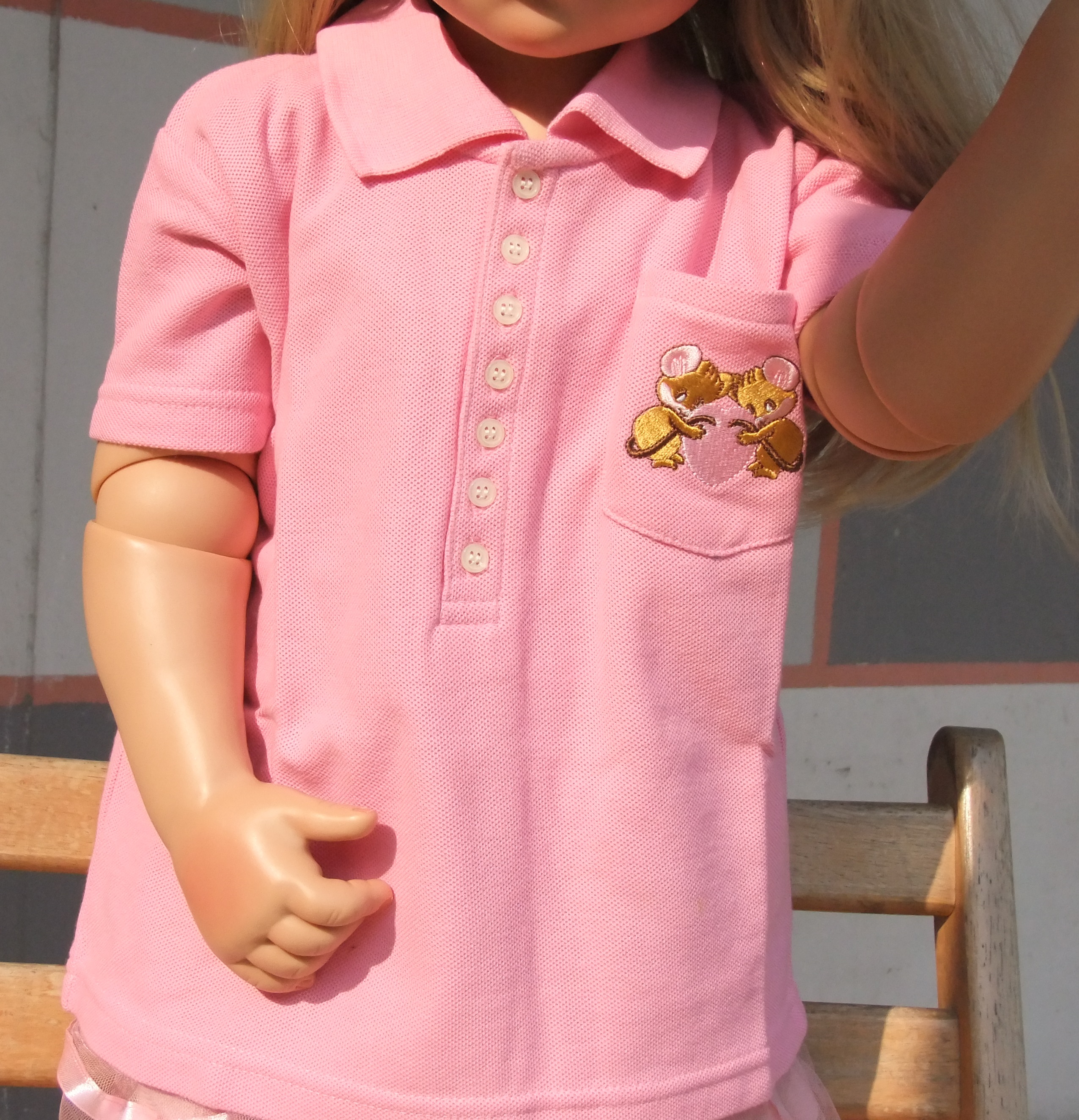 เสื้อโปโลเด็กกระเป๋ามีลายปัก