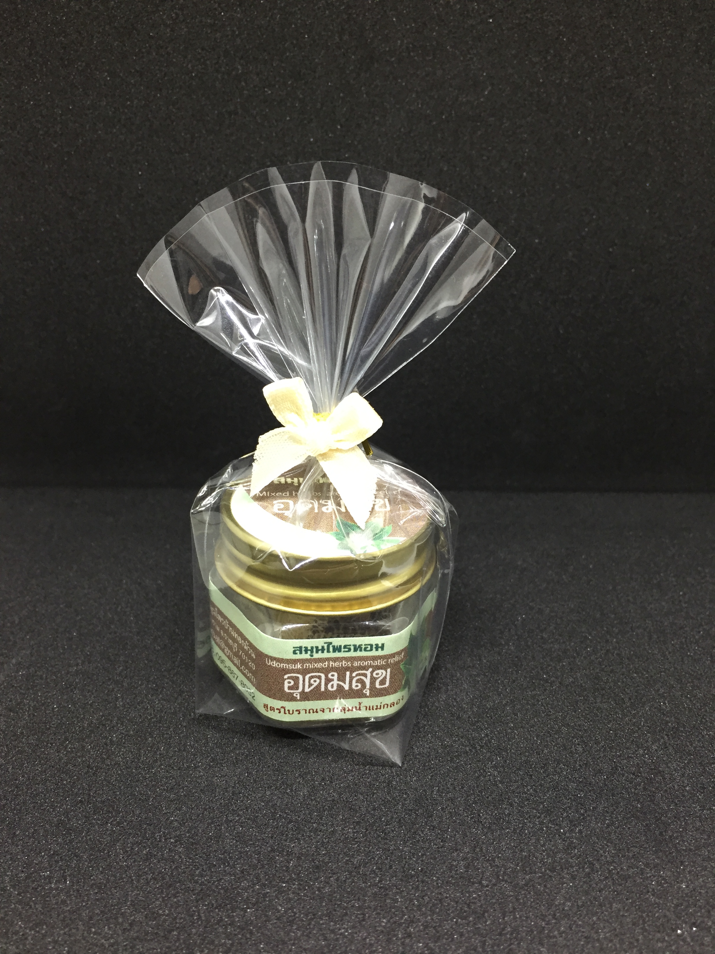 ของชำร่วยงานศพ แบบพิมพ์ชื่อ ใส่ถุงแก้วและติดโบว์