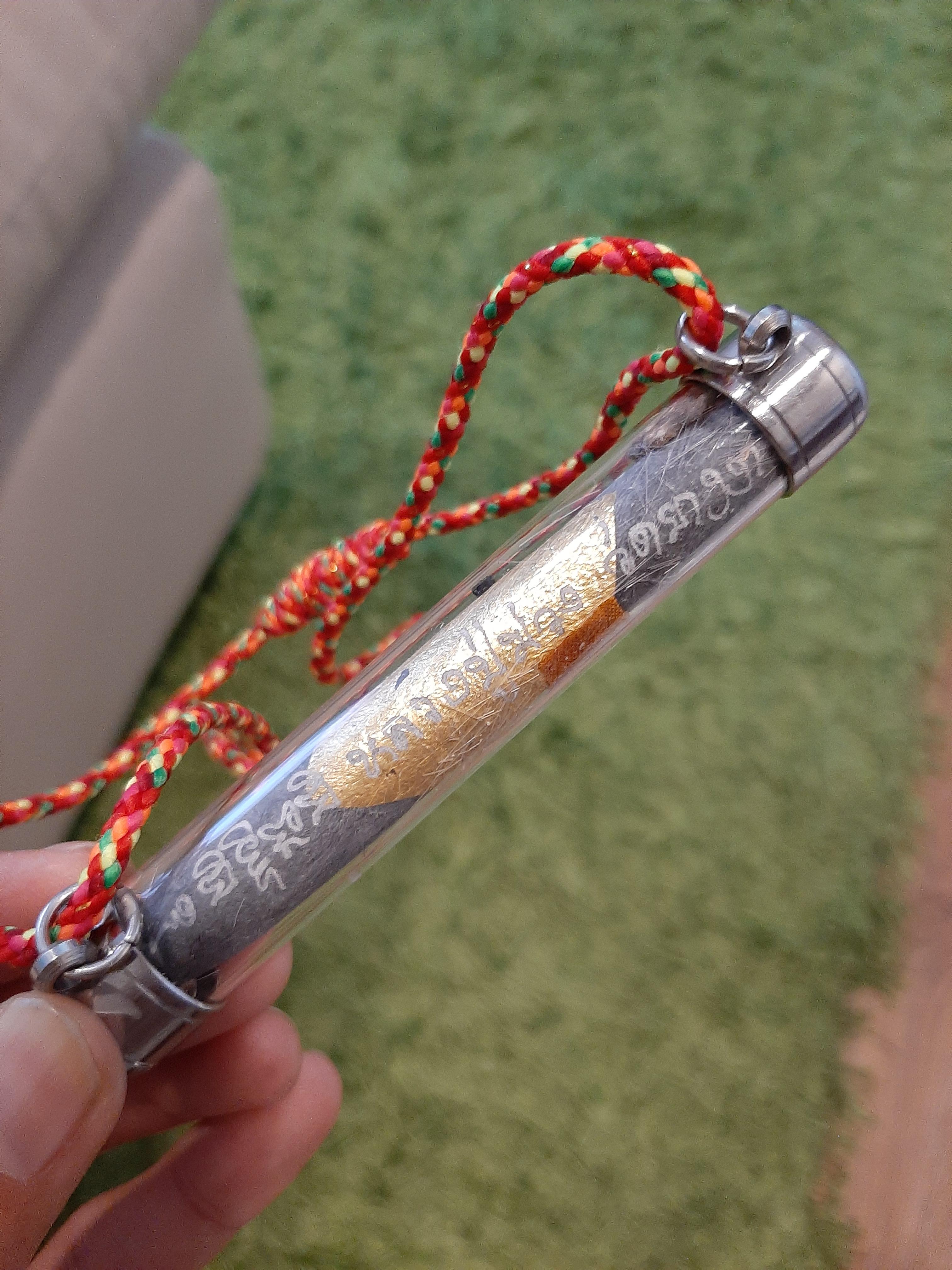 ตะกรุดวัวกินนมเสือ ผงใบลาน มีเกศา ลป.ม่วง วัดยางงาม