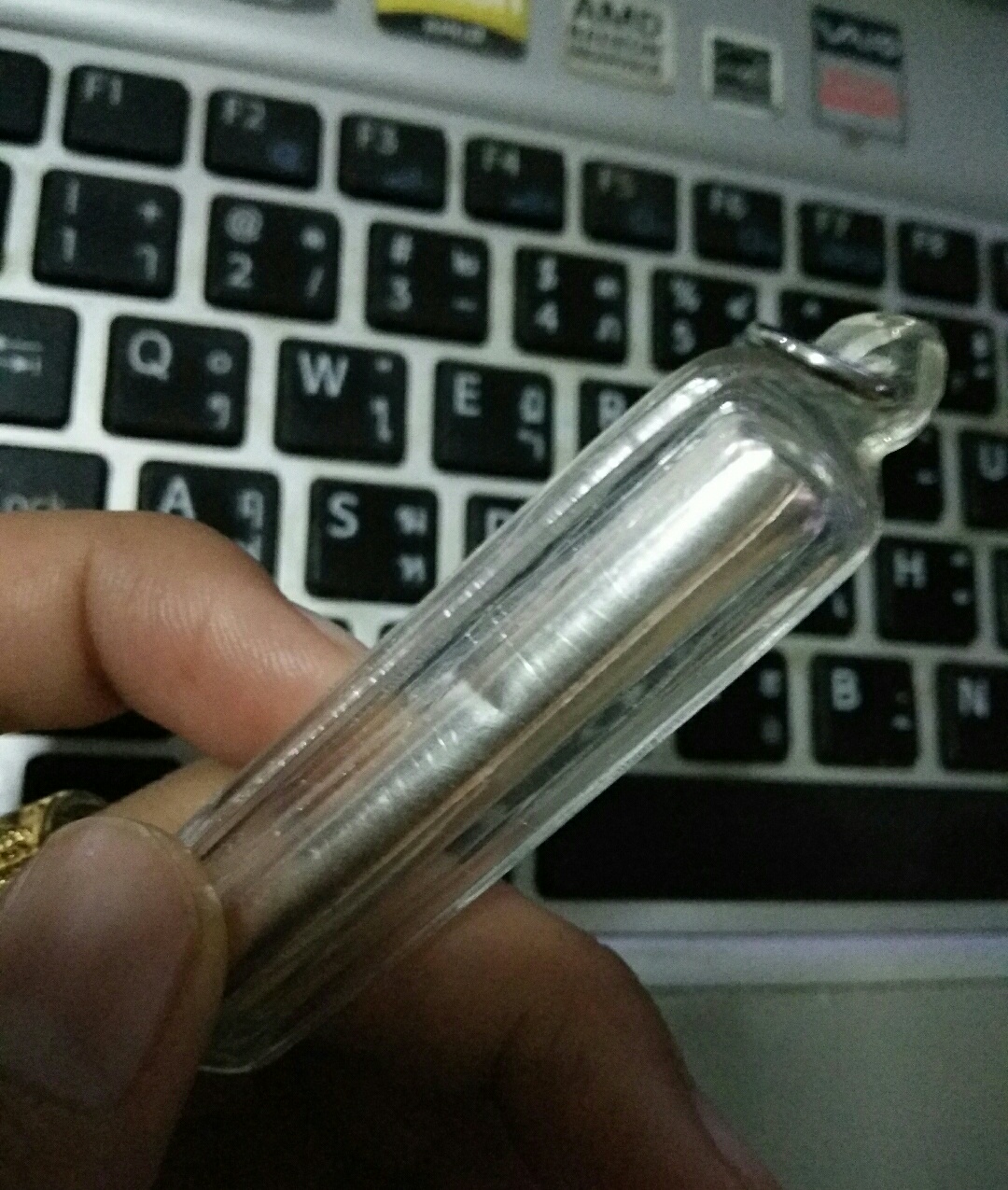 ตะกรุดมหาสะท้อน (เลี่ยมแล้ว มีรอยบุบเล็กน้อย)