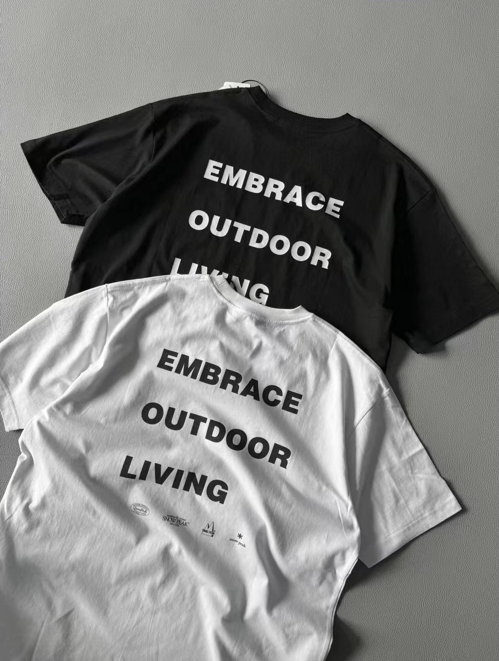 เสื้อโอเวอร์ไซส์ Snow Peak Embrace T-Shirt ของแท้ ของใหม่ พร้อมส่ง เสื้อเดินป่า