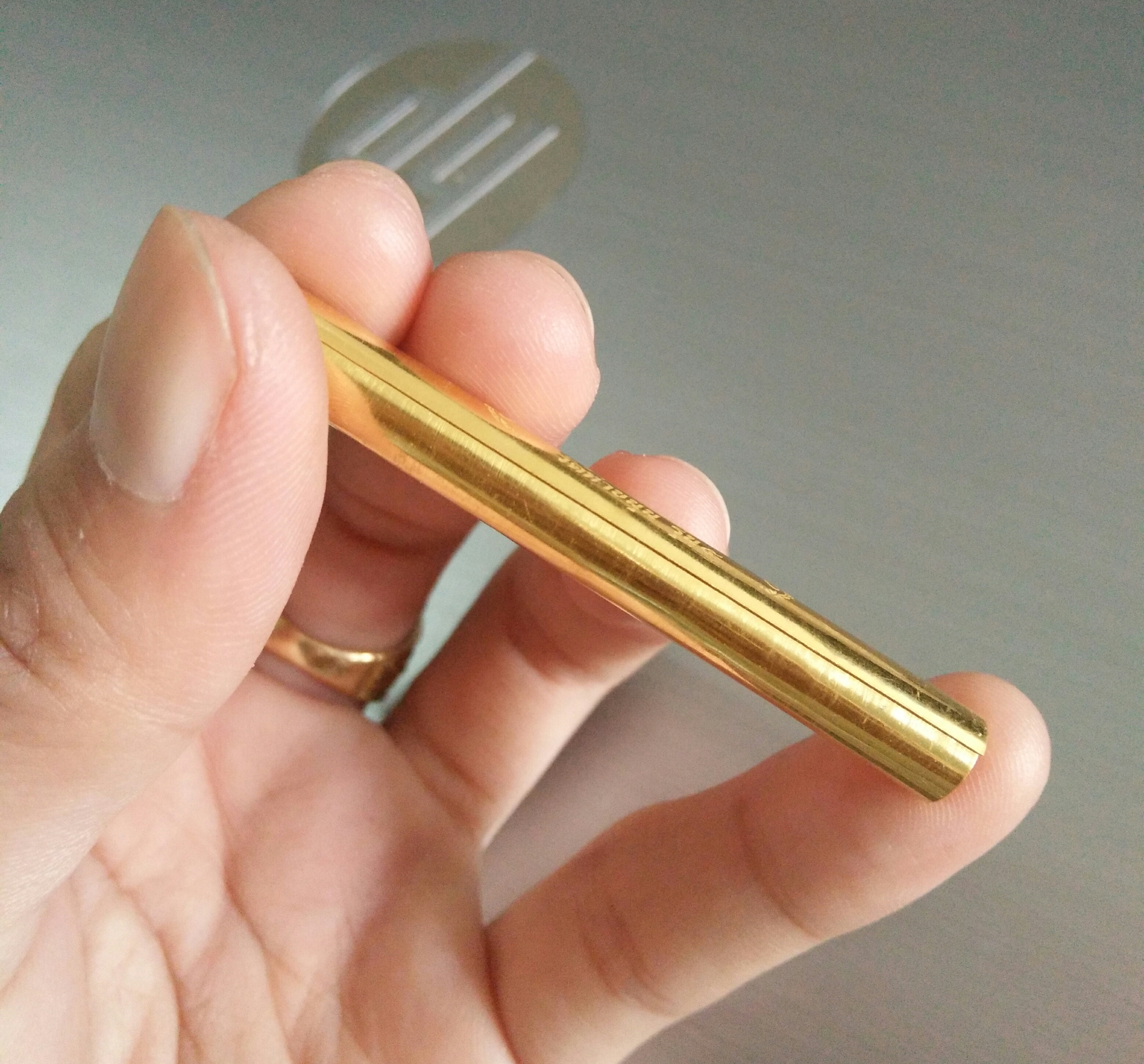 ตะกรุดมหาสะท้อนทองคำ (ซองเดิม)