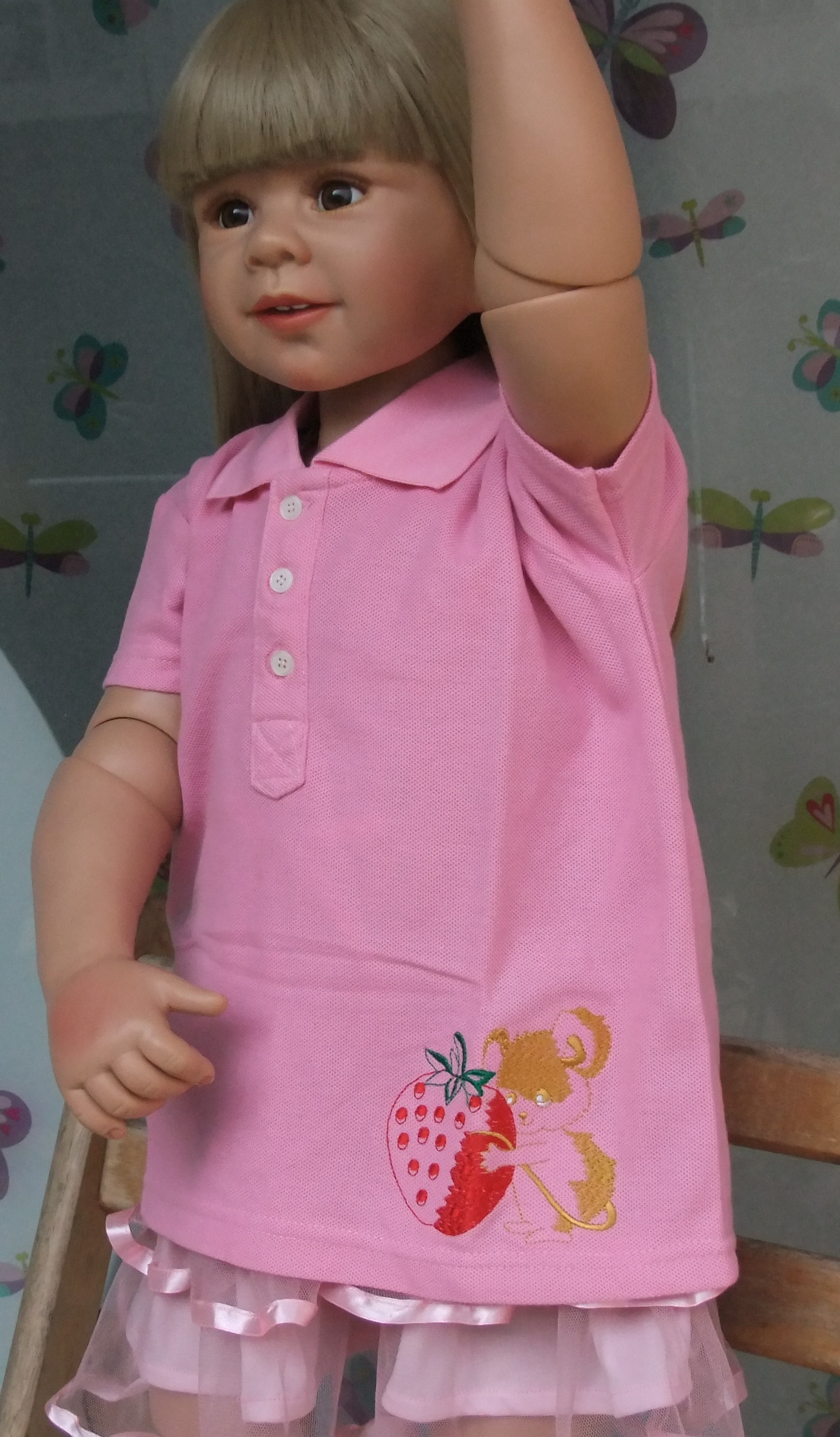 เสื้อโปโลเด็กสีชมพูเนื้อผ้าคอตต้อน