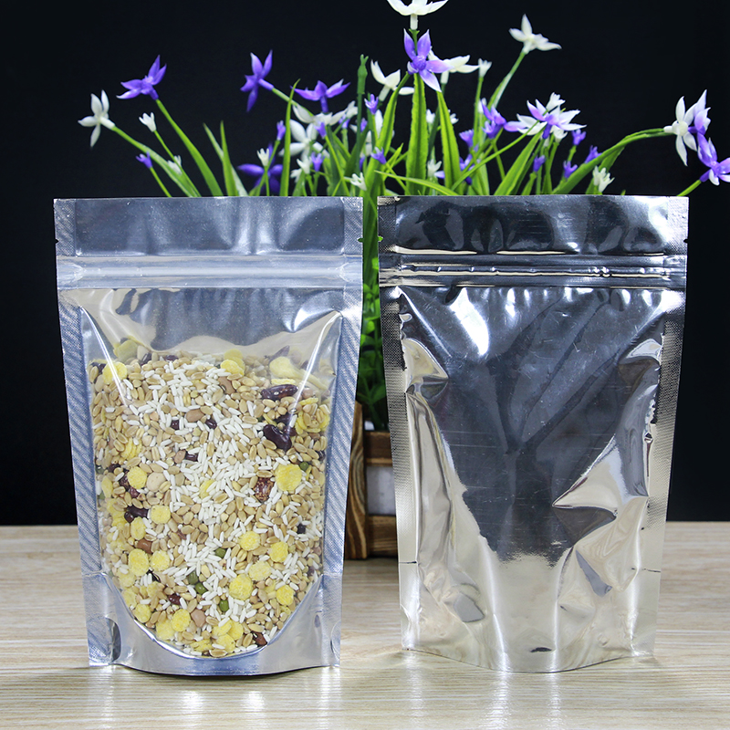 ถุงซิปล็อคก้นตั้ง หน้าใส หลังเงิน