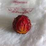 ลูกอมเพลิงพระกาฬ (เพ้นท์สี) ขนาดเล็ก (๑ใน ๙๕ ลูก) หลวงพ่อเอก สำนักสงฆ์เขาธัมมสรณ์ ปี 67